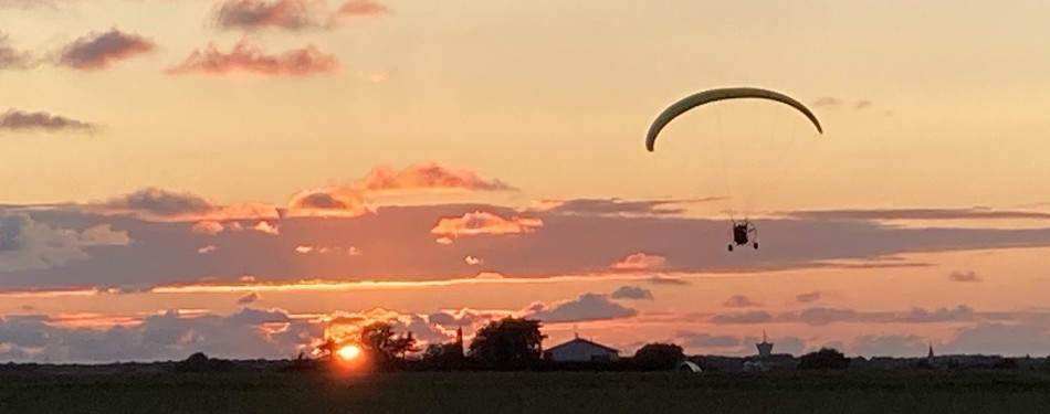 Baptême de l'air couché de soleil